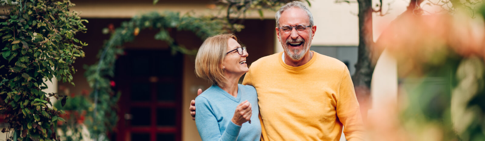 mature couple walking together outside